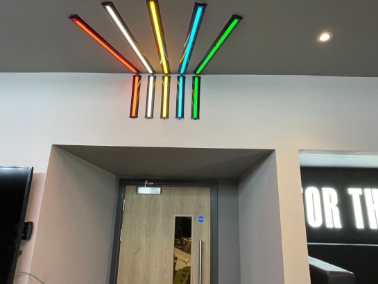 Multicoloured strip LED lights on ceiling
